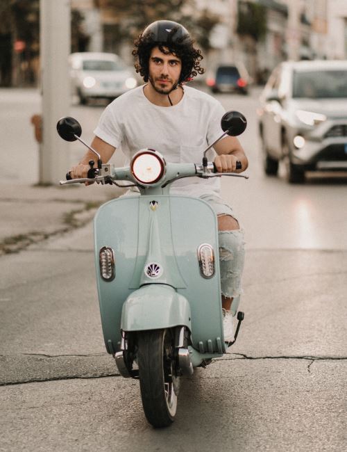Blue Motorreta on street