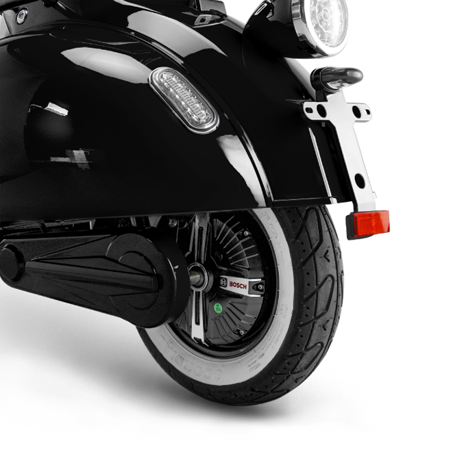 black motoretta on street